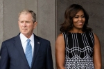 George W Bush, George W Bush and Michael Obama, george w bush passing michael obama some candy is internet s new obsession, Michael obama