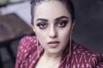 Nithya Menen movies, Nithya Menen in Jayalalithaa bipic, nithya menen stuns movie buffs with jayalalithaa s look in the iron lady, Jayalalithaa biopic