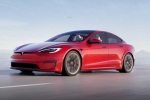Tesla new electric car breaking updates, Tesla new electric car updates, tesla to launch electric hatchback without a steering wheel, Tesla car