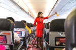 air asia flight, air asia booking ticket low fares, air asia ordered to pay rs 1 54 lakh for harassing serving non veg food to passenger, Air asia